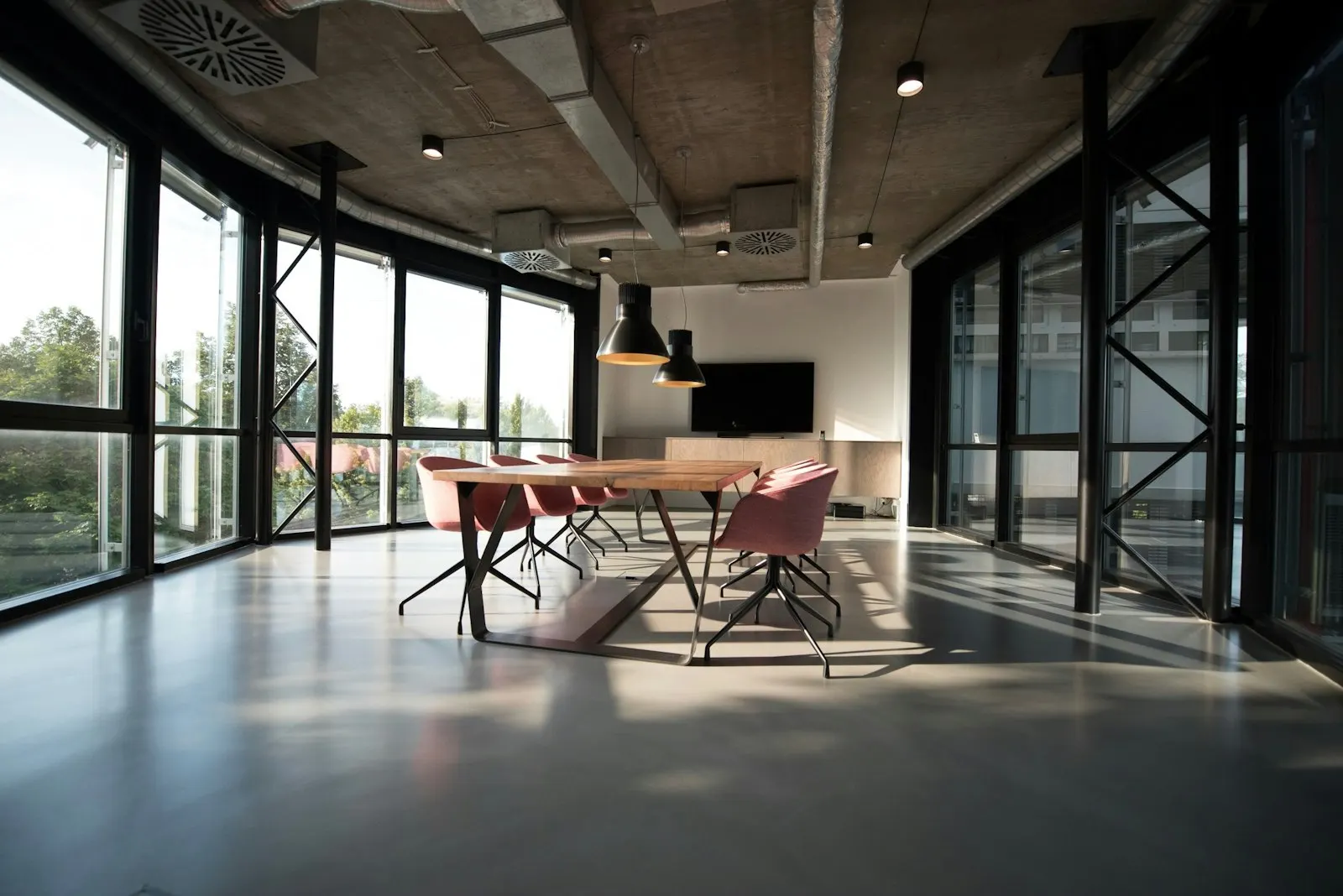 Formal conference room with integrated fluted wall acoustic treatment
